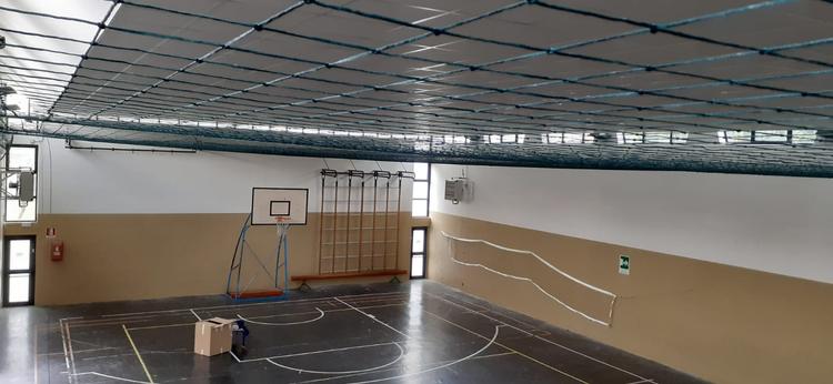 Copertura di protezione per soffitto palestra